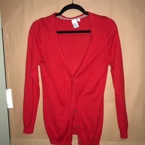 Red cardigan with gold buttons